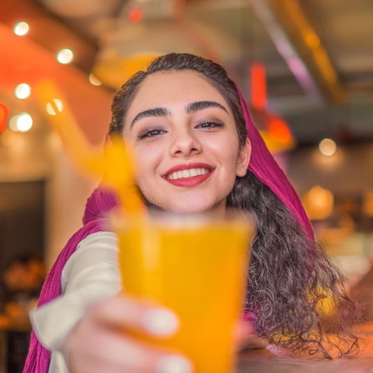 Riley Chen, Client Relations Director, discussing corporate gifting strategy with business clients