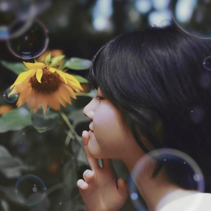 Avery Sloan, Lead Design Curator at BalancedOriginPath, reviewing corporate floral arrangements